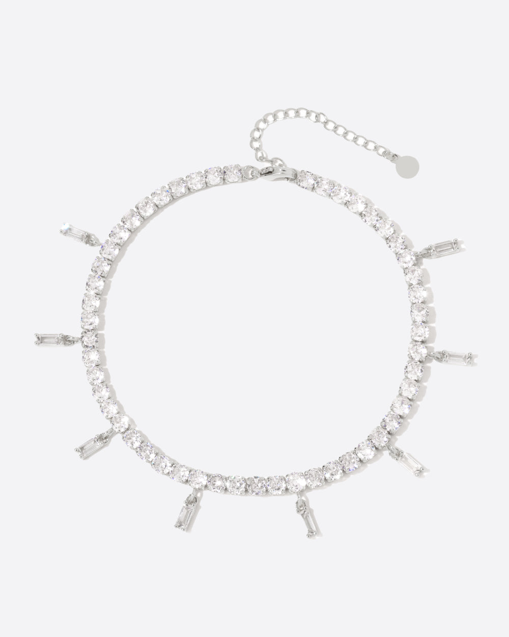 ICED BAGUETTE TENNIS ANKLET. - 4MM WHITE GOLD